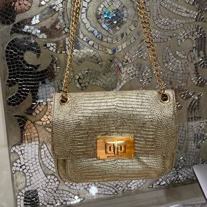 Shoulder/ crossbody going out bag with gold hardware!